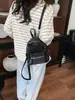 Mochila Mini de Moda Europea Transfronteriza Nueva Bolsa para Mujer de Comercio Exterior Estampado de Leopardo Flor Pequeña en la Espalda Bolsa de Viaje para Mujer