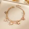 Pulseira de aço titânio para corpo inteiro, venda quente transfronteiriça, feminina, luxo leve, temperamento coreano, galvanoplastia de ouro 18K real, joias no atacado