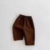 Pantalones rectos holgados de color liso, unisex, estilo coreano moderno INS, pantalones largos de algodón de grado A para niños, primavera/otoño, pantalones zanahoria