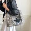Bolso estampado de leopardo para mujer, nuevo modelo de otoño 2026, nicho de alta gama, bolso tote súper popular para el día a día, bolso de hombro de gran capacidad