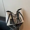 Bolsa de Lona Tote para Mujer de Gran Capacidad Nueva 2024 Bolso Portátil de Nicho Bolso de Hombro para Estudiante Universitario Bolso para Ir a Clase