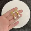 Pendientes de Gato de Ojo de Gato Perla con Forma de Hoja Súper Brillantes, Color Café Maillard, Completamente Incrustados con Diamantes, con un Diseño Exagerado Versátil Elegante y de Moda