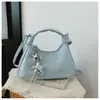 Bolso bandolera de diseño de alta gama y nicho para mujer, bolso de mano moderno y versátil, nuevo bolso de hombro casual para el día a día 2026