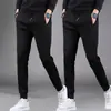 Pantalones casuales gruesos para hombre de primavera y otoño, joggers deportivos holgados de cintura alta de corte slim versátiles con cremallera y perneras rectas
