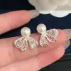 Renda e ouro! Brincos de pérola com laço banhados a ouro 18K real, requintados e versáteis, com um design único