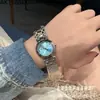 Nuevo Libro Rojo Pequeño TikTok Ola Hogar Corazón Luna Serie Azul Hielo Flor de Cerezo Luna de Daifa Fase Lunar Moda Jialan Reloj de Cuarzo para Mujer