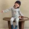 Nuevo conjunto de ropa de casa sin costuras de algodón puro con Lycra para niños, conjunto de pijama de otoño de dibujos animados Clase A para niños y niñas