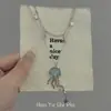 Nuevo Collar Colgante de Medusa Azul Apilado de Doble Capa, Cadena Larga de Suéter de Moda de Nicho de Alto Valor con Borla de Estrella