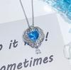 Colgante creativo de alas de ángel con aguamarina en forma de triángulo ancho para mujer, joyería de diseño de alta gama, collar con corazón de mar.