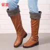 Nuevas botas largas de comercio exterior 2026 invierno deseo estación independiente de Amazon comercio exterior europeo y americano talla grande tacón bajo botas de cuero para mujer
