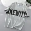 Verano 2025 Nuevo Estilo Algodón Puro Manga Corta Marca de Moda Americana Diseño de Letras y Graffiti Sentido del Diseño Atractivo Holgado y Versátil Ropa