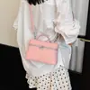Bolso cruzado de un solo hombro, simple y elegante, nuevo bolso de mano de moda nicho, bolso cuadrado pequeño para mujer, rosa, tamaño mediano