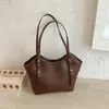 Bolsa de ombro única nova, versátil, moderna e retrô, com design minimalista, bolsa de mão feminina, bolsa saco, grande capacidade para o outono de 2026