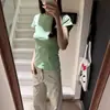 Camiseta Popular de Alta Gama de Color Sólido con Mangas Cortas para Mujer, Verano 2025, Corte Ajustado, Estilo Casual Simple, Top para Viajar al Trabajo