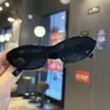 Gafas de sol de ojo de gato con montura pequeña transfronterizas gafas de sol para fotografía show de gafas de sol compras genial anti-ultravioleta moda europea y americana niños nuevo
