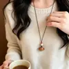 Nuevo collar colgante de oso retro estilo chino para mujer, cadena para suéter de diseño único, accesorio de moda, simple, versátil al por mayor