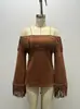 Top vintage europeo y americano con flecos para mujer, nuevo T-shirt western de un hombro con manga acampanada de gamuza, hombros descubiertos
