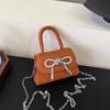 High-end textura laço saco pequeno feminino verão 2024 nova corrente crossbody boca envelope vermelho portátil mini saco quadrado