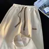 Pantalones largos casuales unisex holgados de verano, pantalones de moda versátiles de pierna recta, pantalones anchos de seda de hielo fina de alta gama