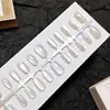Puntas de Uñas Artísticas Simples Transparentes Estilo Ojo de Gato Anchas Tiras Pre-hechas 30 Piezas Por Tamaño Uñas Portátiles Fábrica Directa Personalización