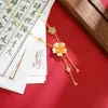 Nuevo diseño de collar vietnamita estilo chino en oro de arena, sensación de gota de aceite, flor de cerezo, doble borla, cadena para la clavícula, joyería de lujo ligero sin decoloración a largo plazo
