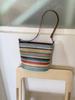 Bolso Tejido de Alta Gama con Rayas de Color Contrastante Transfronterizo de Gran Capacidad para un Solo Hombro, Bolso de Axila, Estilo Occidental Casual, Bolso Tipo Cubo, Bolso Cruzado