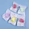 Huevos de maquillaje de belleza de alta calidad no comen polvo borla de polvo portátil cojín de aire embalaje independiente huevos de esponja de maquillaje calabaza gotas de agua corte oblicuo