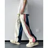 Calça Casual Esportiva Masculina de Seda Gelo com Bloqueio de Cores Estilo Americano, Secagem Rápida, Três Listras, Design Único, Corte Reto Solto