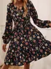 Vestido otoñal exclusivo transfronterizo europeo y americano para mujer, estampado floral de cuello en V, suave y elegante, con cinturón de corbata, bajo con volantes y mangas abullonadas