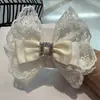 Pinza para el pelo con lazo bordado de pedrería y encaje estilo coreano - Venta de liquidación de accesorios para el cabello