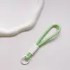 Correa de Muñeca Trenzada Estilo Ins Lanyard Nudado Cuerda Corta de Silicona Colgante Antiperdida para Teléfono Dopamina