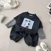 Conjunto de sudadera linda de dibujos animados estilo coreano 2026 para bebés niños, top holgado, conjunto casual de dos piezas para niños