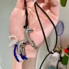 Colar Pingente Cavalo de Vidro com Corda de Cera Moda Personalidade Nicho Corrente para Clavícula Simples Versátil Joias de Alto Padrão Atacado