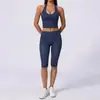 Nuevos pantalones de yoga de longitud media de estilo europeo y americano para mujer, de cintura alta, que levantan los glúteos y aprietan el abdomen, con efecto de caída, y un conjunto deportivo de cuello halter para fitness y Pilates