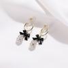 Aretes de Lazo Diseño Nicho Sentido Negro Aretes de Lujo Ligero de Alta Gama Aretes Aretes Plato de Incienso para Mosquitos Clip para la Oreja Mujer