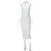 Vestido de outono novo sexy com decote U, costas nuas, justo, zíper, fenda, gola halter, cruzado europeu e americano, vestuário feminino atacado