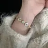 Protección del Dios del Mar Nácar Natural Incrustado con Diamantes, Pulsera de Concha de Gama Alta Estilo Francés, Venta Directa de Fábrica, Dropshipping Disponible.