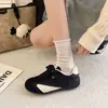 Primavera 2026 Novo Retro Sapatos Forrest Gump Femininos Malha Respirável Casuais Esportivos Versáteis Pretos Treinamento Alemão para Estudantes