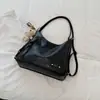 Bolso de hombro liso nuevo para principios de otoño de 2026 para el trabajo y los desplazamientos, bolso cruzado personalizado informal de gran capacidad a la moda
