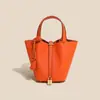 Bolso Canasta de Piel de Vaca de Primera Capa Clásico, Bolso Cubo de Piel Genuina de Lujo Ligero y de Gama Alta, Bolso de Mano de Moda Transfronteriza y Versátil