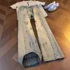 Jeans retro azules de corte diagonal para hombre, primavera y otoño, diseño elegante y genial, vibra de la alta calle americana, pierna recta, pantalones ligeramente acampanados