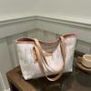 Bolso de mano informal de gran capacidad, a rayas, de moda, estilo nuevo de invierno 2025, elegante y fresco, para llevar al hombro o debajo del brazo, para mujer.