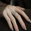 Anillo de Plata de Ley 925 Estilo Chino Nuevo Temperamento Retro Alto Grado Diseño Hueco Sentido de Diseño Anillo de Dedo de Superficie Ancha Apertura Ajustable Flor de Loto Entrelazada