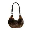 Bolso de hombro de gran capacidad de alta gama para mujer para otoño e invierno 2026 nuevo bolso de felpa peludo vintage para debajo del brazo