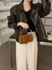 Chaqueta de cuero estilo BF retro elegante con solapa y bolsillo con cremallera, holgada y versátil, para mujer, de Dongdaemun, Corea