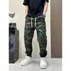 Pantalones versátiles de camuflaje estilo streetwear americano para primavera y otoño para hombre, con cordón, holgados, rectos, multibolsillos, casuales, para el día a día