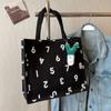 Bolsa Tote de Ombro Grande Capacidade Coreana para Mulheres 2026 Bolsa de Mão Fashionável para Passeio Bolsa de Mãe Bolsa de Lona para Aula de Estudante
