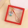 Colgante para teléfono móvil de danza del león de bendición, accesorio para bolso y llavero de coche, colgante auspicioso de hilo rojo estilo chino, disponible para venta al por mayor