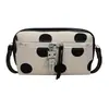 Bolso bandolera de lunares de nicho superpopular coreano para mujer, bolso baguette informal versátil de gran capacidad para el verano 2026