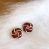 Pendientes de Estilo Chino para Otoño e Invierno Diseño de Nicho Retro Esmalte Goteante Exquisito Temperamento Pendientes Retorcidos de Moda para Mujer